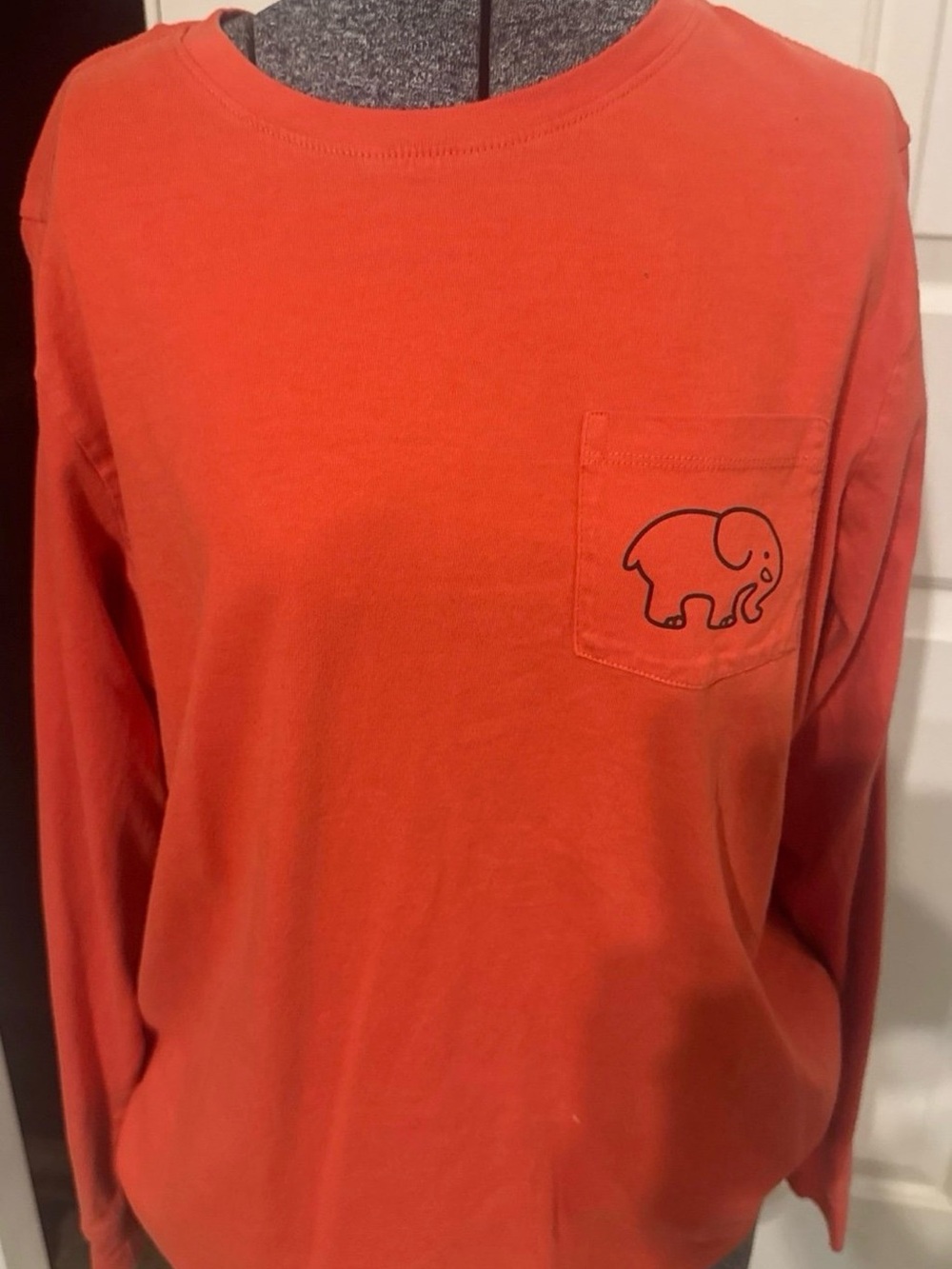 ivory ella Kids Long-Sleeve Pocket Tee in Orange with Elephant Graphic